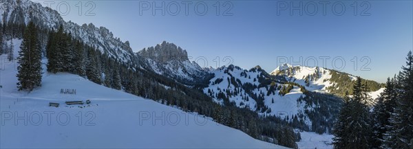 Hashtag Jaun, winter landscape below the Gastlosen and Marchzaehne, drone shot, Jaun, Fribourg, Switzerland, Europe