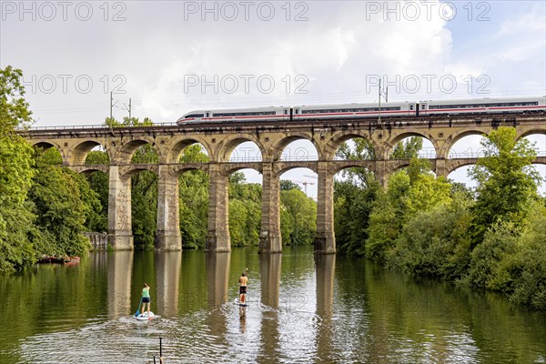 Enz viaduct Bietigheim with InterCityExpressICE of Deutsche Bahn, railway viaduct over the river Enz, stand-up paddler, Bietigheim-Bissingen, Baden-Wuerttemberg, Germany, Europe