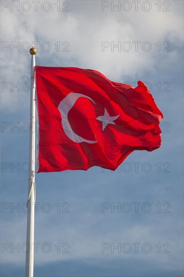 Turkish national flag hang in view in open air