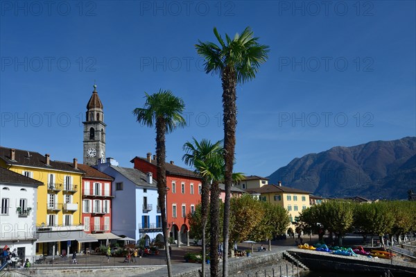 Lake promenade in Ascona with church Santi Pietro e Paolo, Lungolago, Canton Ticino, Switzerland, Europe