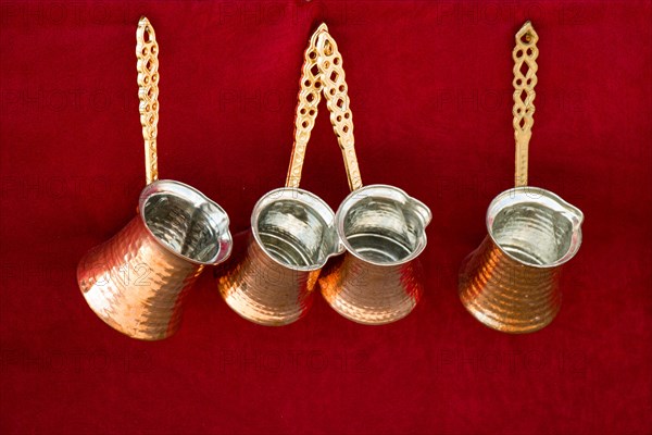 Turkish coffee pots made of metal in a traditional style