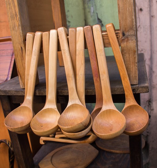 Dozens of soup spoon or tablespoon made of wood