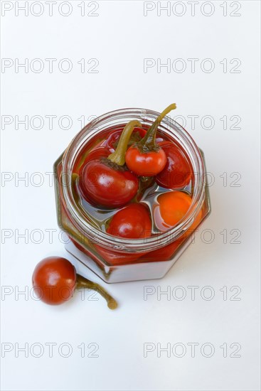 Jarred cherry peppers in vinegar, chilli, paprika