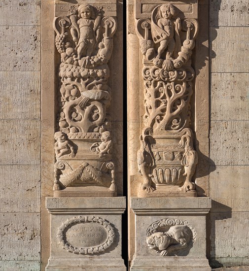 Left and right column of the historic entrance portal from 1910, detail, Chamber of Industry and Crafts, Nuremberg, Middle Franconia, Bavaria, Germany, Europe