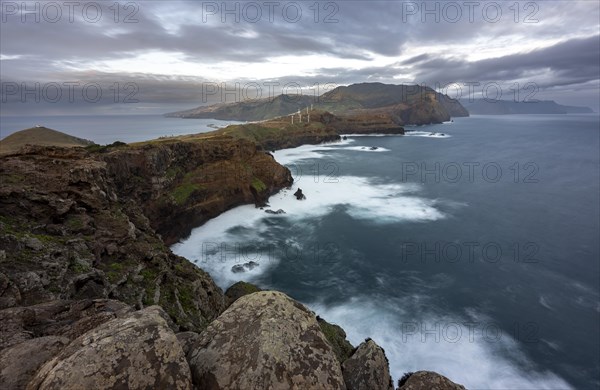 View of the island, cliff with red cliffs and sea at sunset, long exposure, Baixas do Guincho, volcanic peninsula Sao Lourenco, Ponta de San Lorenzo, Madeira, Portugal, Europe