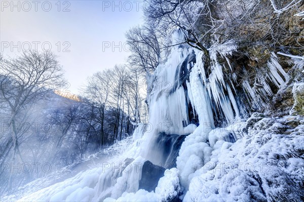 Icicles at the waterfall, permafrost with icy landscape, Swabian Alb, Bad Urach, Baden-Wuerttemberg, Germany, Europe