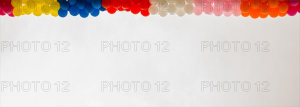 Color balloons on the roof of a building