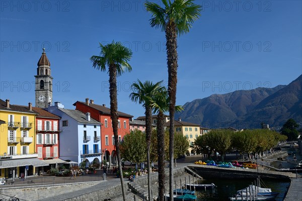 Lake promenade in Ascona with church Santi Pietro e Paolo, Lungolago, Canton Ticino, Switzerland, Europe