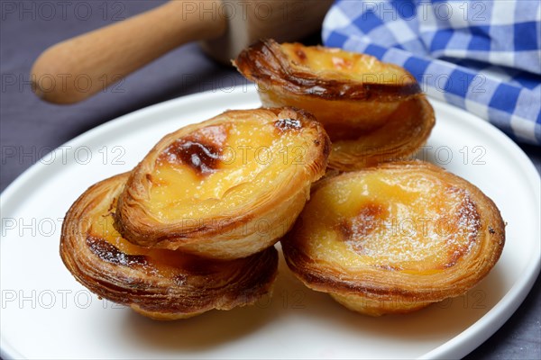 Pastel de Nata, Pasteis de Nata on a plate, custard tart, Portuguese speciality