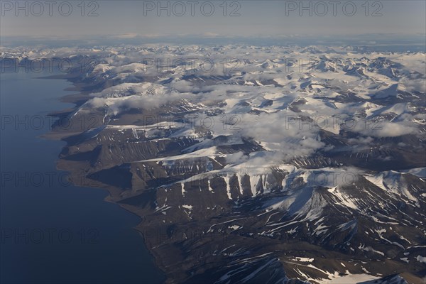 Aerial view, Van Mijenfjord and glaciated mountain landscape with inland ice, Svalbard