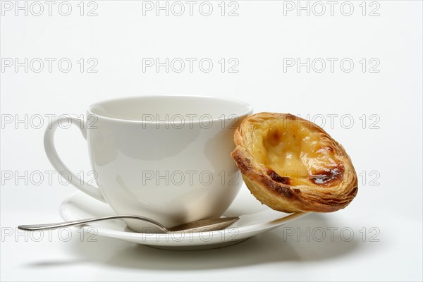 Pastel de Nata, Pasteis de Nata with coffee cup, custard tart, Portuguese speciality