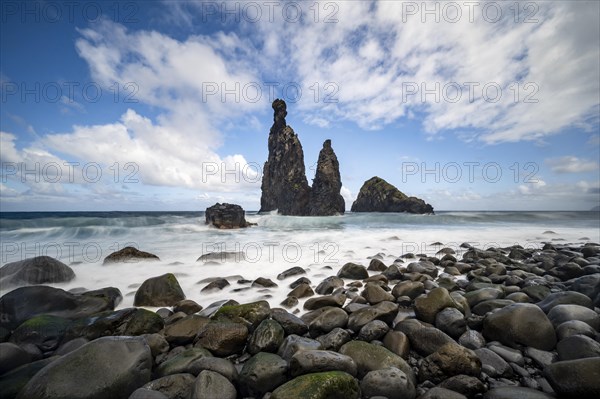 Long exposure, beach with volcanic rock, rock formation Ilheus da Rib and Ilheu da Ruama in the sea, Praia da Ribeira da Janela, Madeira, Portugal, Europe