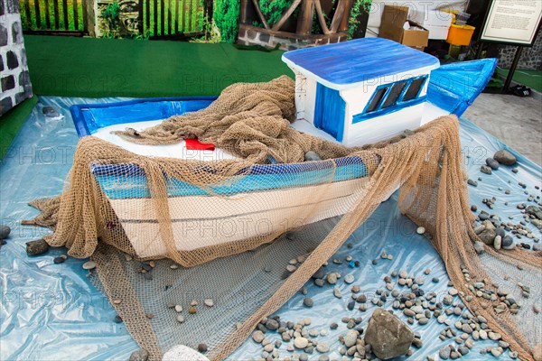 Mini size little colorful model boat in view