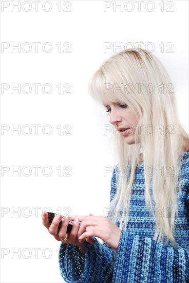 Portrait of blond woman phoning