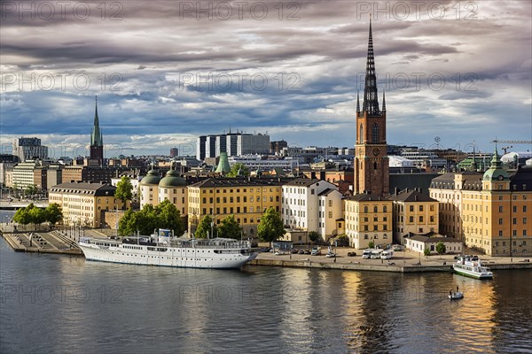 View from the viewpoint Monteliusvaegen to the island Riddarholmen, old town Gamla Stan, evening light, Stockholm, Maelaren, Sweden, Europe