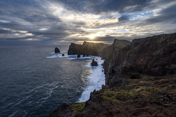 Red cliffs and rocks in the sea, coastal landscape, at sunrise, Miradouro do Canical, Ponta de Sao Lourenco, volcanic peninsula of Sao Lourenco, Ponta de San Lorenzo, Madeira, Portugal, Europe