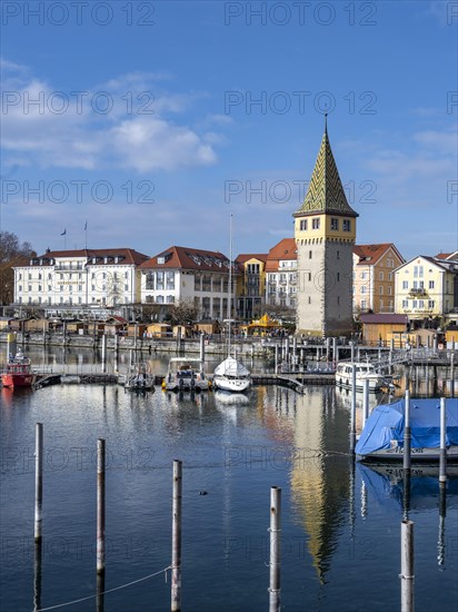 Sailboats in the harbour, harbour promenade with Mangturm, reflected in the lake, harbour, Lindau Island, Lake Constance, Bavaria, Germany, Europe