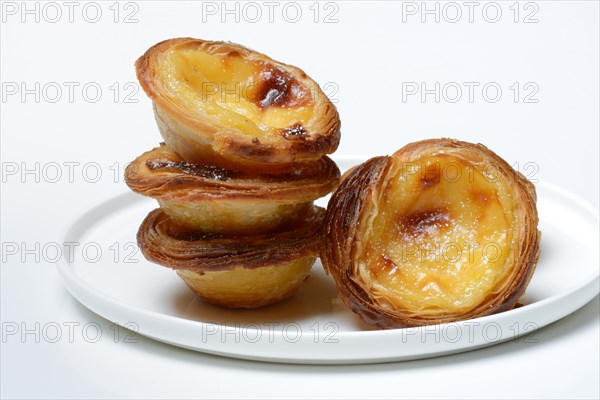 Pastel de Nata, Pasteis de Nata on a plate, custard tart, Portuguese speciality