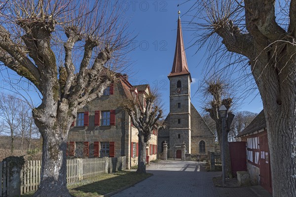 Historic vicarage from 1734 with the St.Egidienkirche built in 1488, Beerbach, Middle Franconia, Bavaria, Germany, Europe