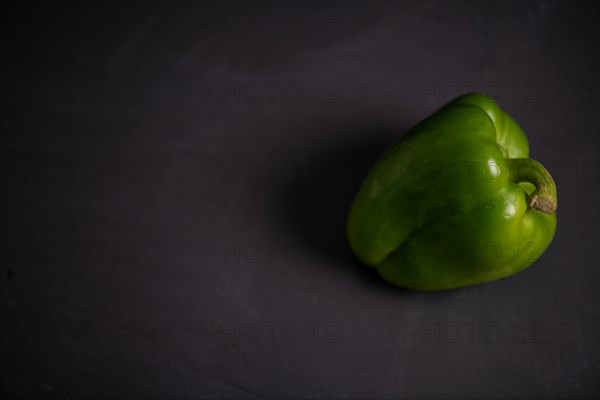 Green peppers on slate, fitness, cooking, vegetarian, vegan, vitamins, cultivation, healthy, close up, kitchen