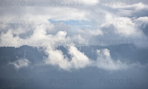 Cloudy forested mountains, Vorarlberg, Austria, Europe