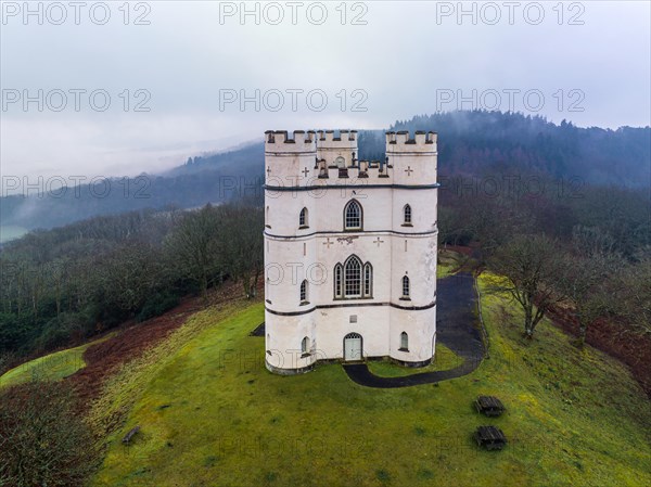 Misty morning over Haldon Belvedere from a drone, Lawrence Castle, Higher Ashton, Exeter, Devon, England, United Kingdom, Europe