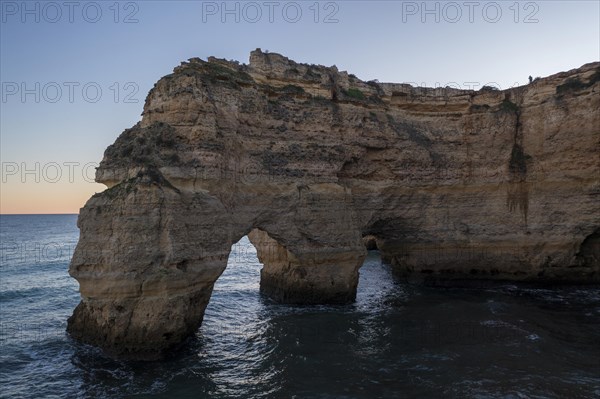 Sunset at Praia da Marinha, rocks and cliffs, steep coast in the Algarve, Portugal, Europe