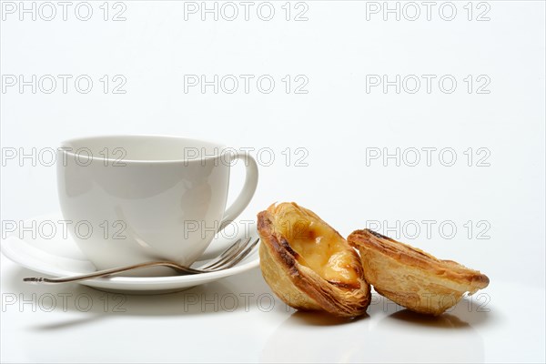 Pastel de Nata, Pasteis de Nata with coffee cup, custard tart, Portuguese speciality