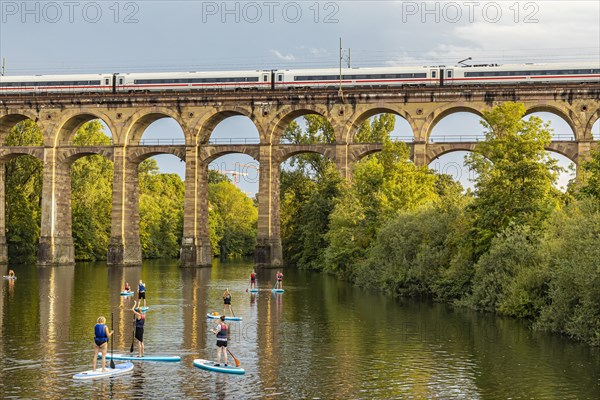 Enz viaduct Bietigheim with InterCityExpress ICE of Deutsche Bahn, railway viaduct over the river Enz, stand-up paddler, Bietigheim-Bissingen, Baden-Wuerttemberg, Germany, Europe