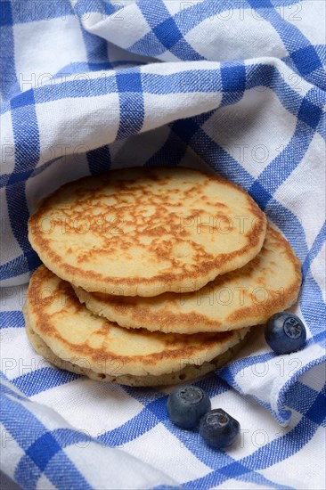 Blini, blinis on kitchen towel, mini pancakes