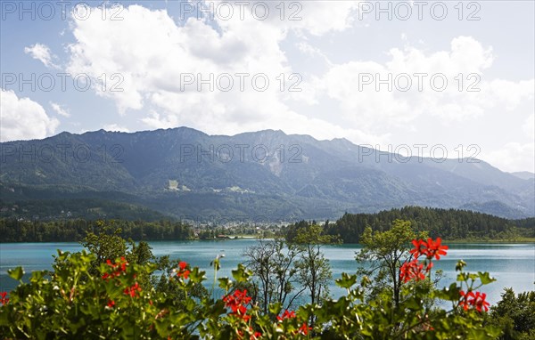 Schwarzkogel mountain and Faaker See lake, Villach and Finkenstein municipalities, Carinthia, Austria, Europe