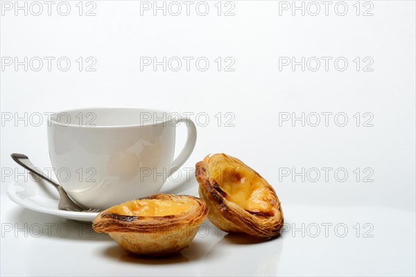 Pastel de Nata, Pasteis de Nata with coffee cup, custard tart, Portuguese speciality