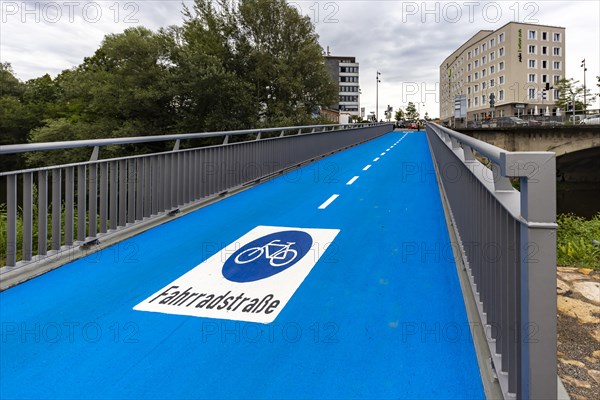 Cycle bridge over the Steinlach, the cycle path is heated for safe and snow-free rides in winter, Tuebingen, Baden-Wuerttemberg, Germany, Europe