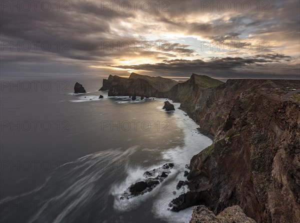 Red cliffs and rocks in the sea, coastal landscape, long exposure at sunset, Miradouro do Canical, Ponta de Sao Lourenco, volcanic peninsula Sao Lourenco, Ponta de San Lorenzo, Madeira, Portugal, Europe