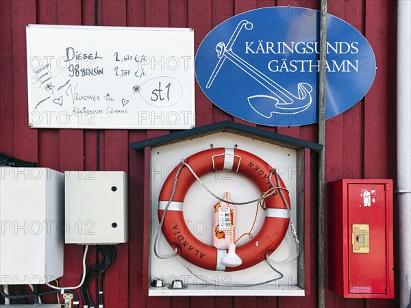 Facade on the boathouse, petrol station for boats, high prices for diesel and petrol, handwritten, energy crisis, harbour in the fishing village of Kaeringsund, Fasta Aland, Aland Islands, Aland Islands, Finland, Europe