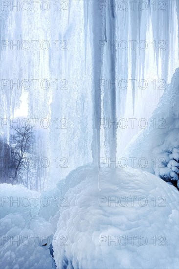 Icicles at the waterfall, permafrost with icy landscape, Swabian Alb, Bad Urach, Baden-Wuerttemberg, Germany, Europe