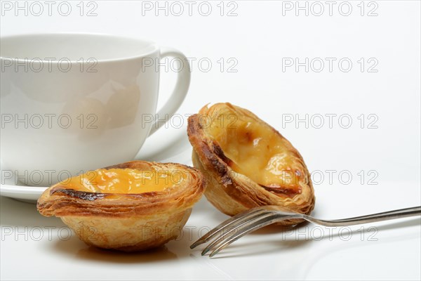 Pastel de Nata, Pasteis de Nata with coffee cup, custard tart, Portuguese speciality