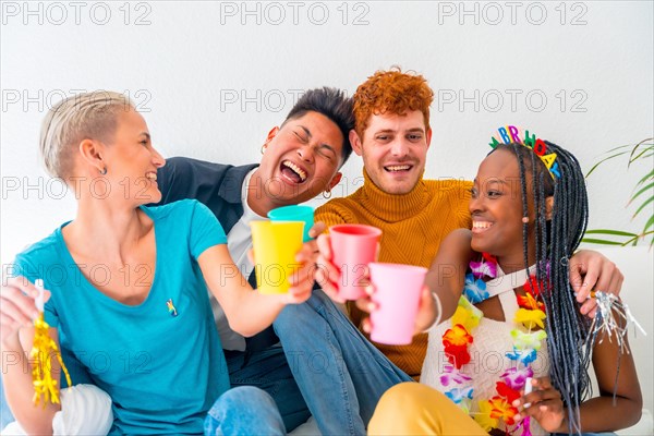 Lgtb couples of gay boys and girls lesbian in a portrait on a sofa at a house party, birthday party, having fun