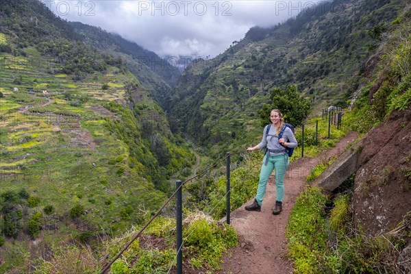 Hiker on Levada do Moinho, Ponta do Sol, Madeira, Portugal, Europe