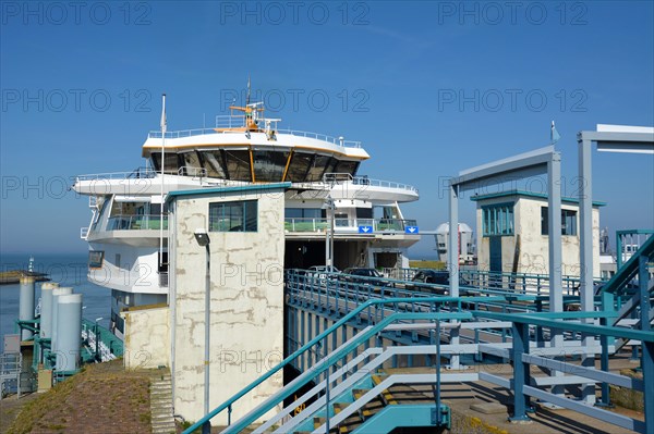 Den Helder, North Netherlands, August 2019: Cars leaving dutch double ended ferry called Texelstroom going between mainland Netherlands Den Helder and tourist island Texel