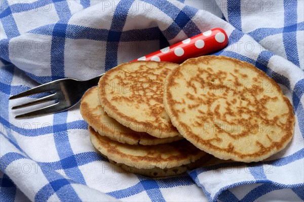 Blini, blinis on kitchen towel, mini pancakes