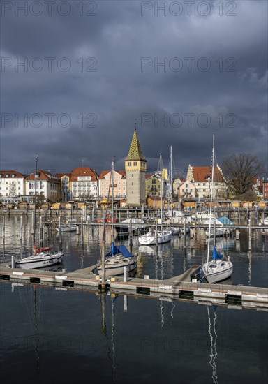 Sailboats in the harbour, harbour promenade with Mangturm, reflected in the lake, harbour, Lindau Island, Lake Constance, Bavaria, Germany, Europe