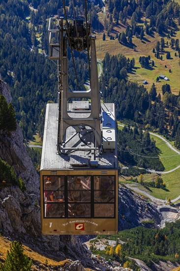 Cable car gondola in front of the entrance to the mountain station at the Seceda summit, Val Gardena, Dolomites, South Tyrol, Italy, Europe