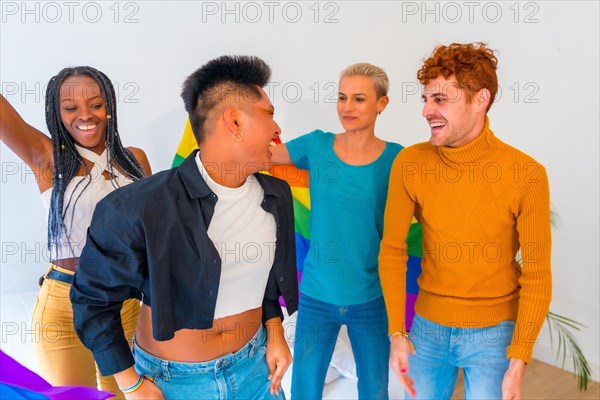 LGBT pride, lgbt rainbow flag, group of friends dancing and having fun in a house at the party