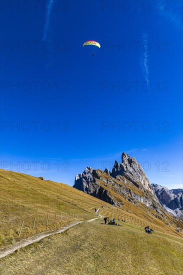 Paragliding flight over the Geisler Group, Val Gardena, Dolomites, South Tyrol, Italy, Europe