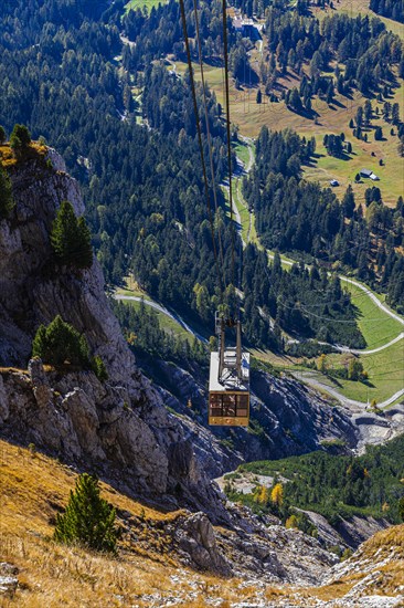 Cable car gondola in front of the entrance to the mountain station at the Seceda summit, Val Gardena, Dolomites, South Tyrol, Italy, Europe