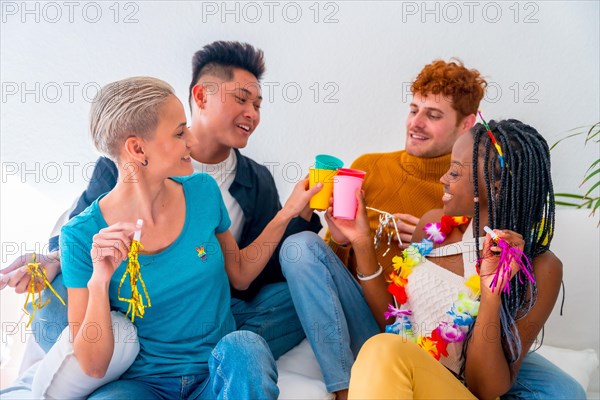 Lgtb couples of gay boys and girls lesbian in a portrait on a sofa at a house party, birthday party, toasting with glasses