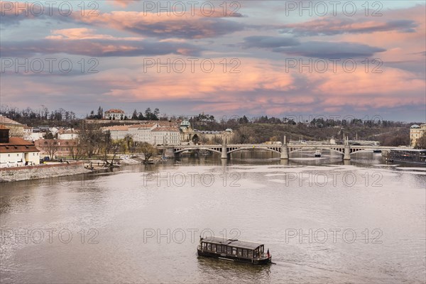 View of Moldava River at sunset located in Prague, Czech Republic, Europe