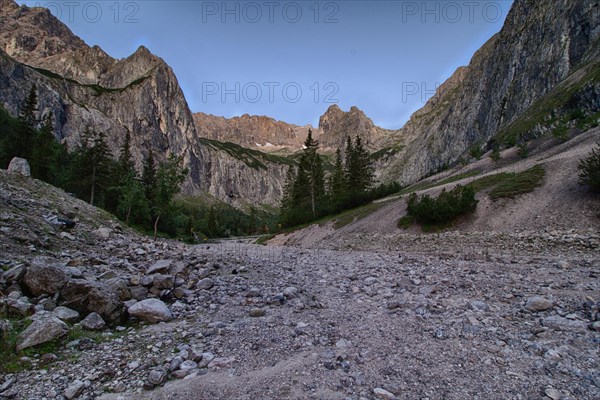 Mountain hiking trail with a view of the rocks. Zugspitze massif in the bavarian alps, Bavarian alps, Germany, Europe