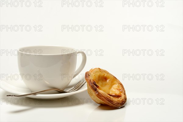 Pastel de Nata, Pasteis de Nata with coffee cup, custard tart, Portuguese speciality